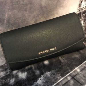 Michael Kors (Lg) black leather wallet.